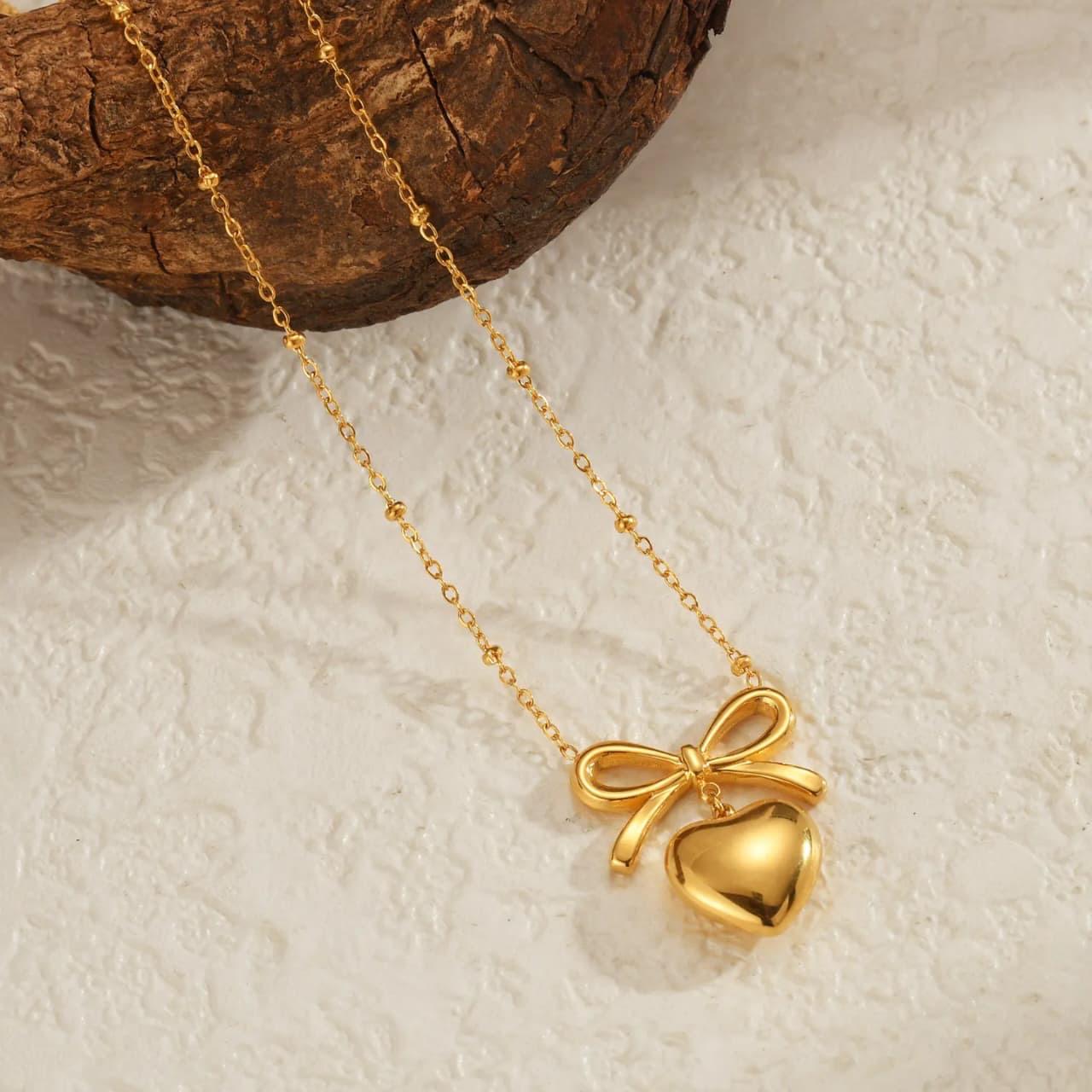 BOW HEART NECKLACE