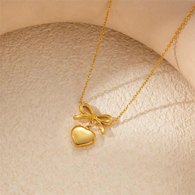 BOW HEART NECKLACE